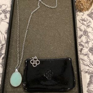 Stella and Dot necklace and zippered black purse.